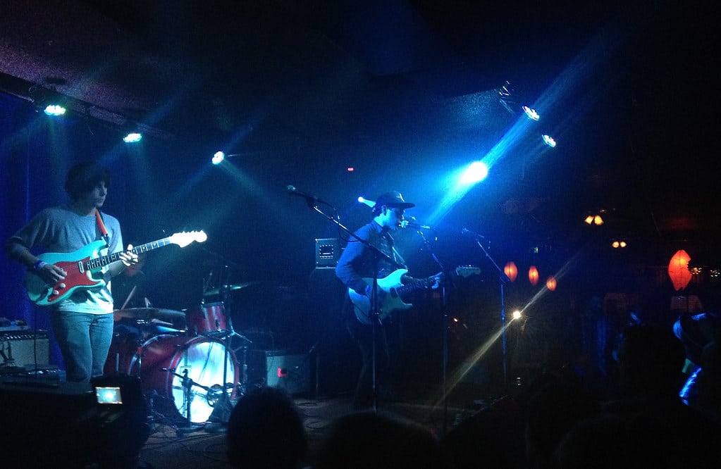 Live music concert venue with stage lighting