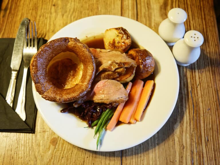 Family-style roast dinner spread for Cogan's Place private chef service